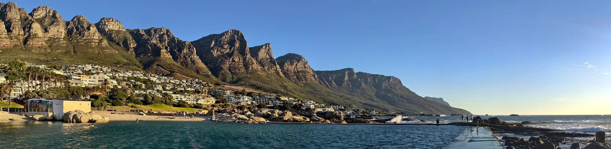 Camps Bay Tidal Pool with Twelve Apostles mountain range