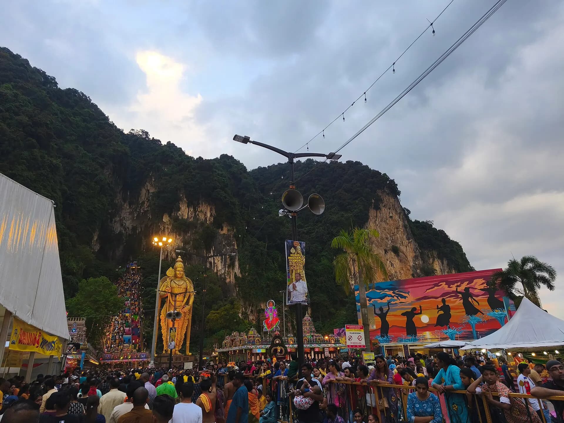 Thaipusam 2025 Lord Murugan Statue and Illumined Main Stairs at Dusk in Batu Caves (250211)