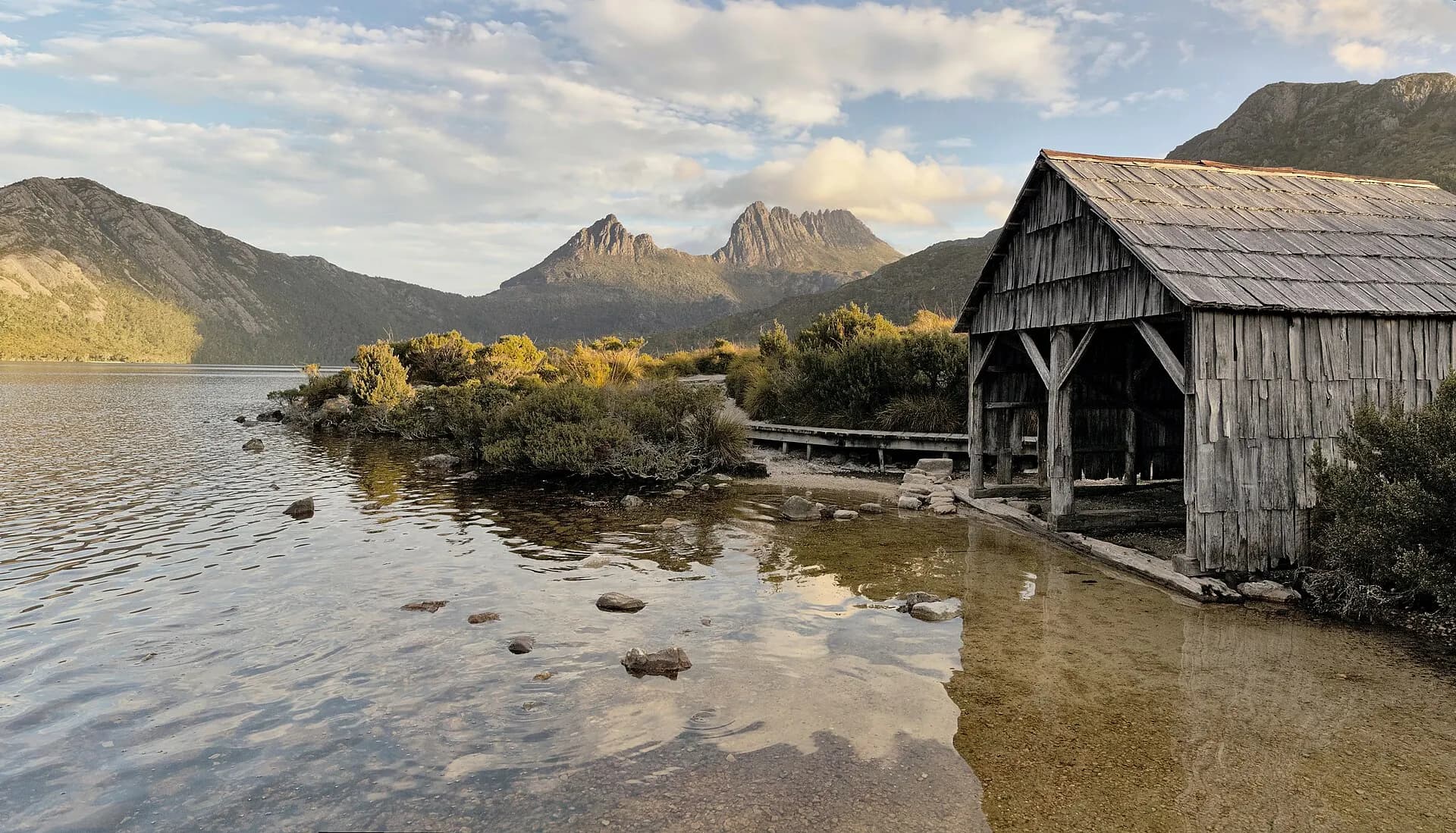Boat shed and Cradle Mountain at Dove Lake, Tas
